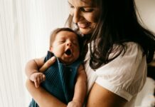 입양 전 과정 국가가 책임진다…국내 입양 활성화 정책 추진 woman in white shirt carrying girl in blue shirt