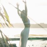 건강한 일상 위한 ‘웰니스 문화’, 일상 속 작은 실천에서 시작된다 woman standing near body of water