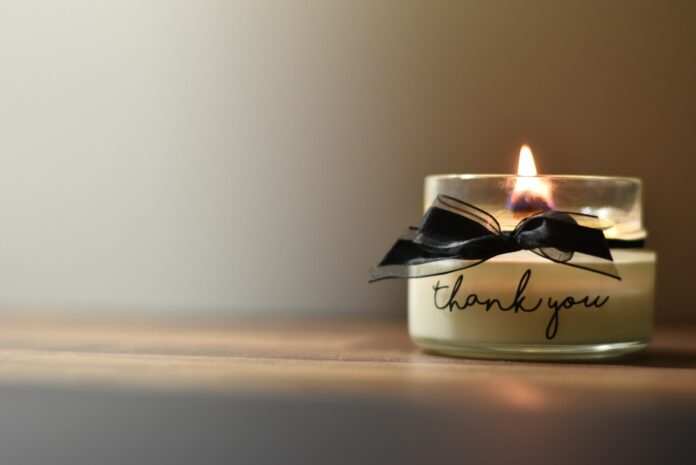 Photo by Daniel Andrade white and black candle holder