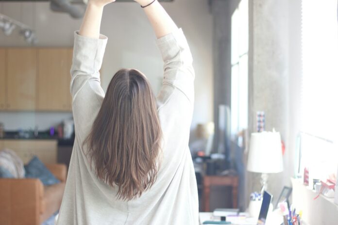 Photo by Hunter Leibler woman in white long sleeve shirt